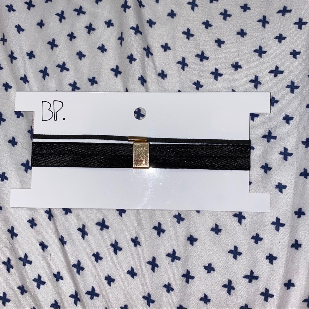 Black choker.